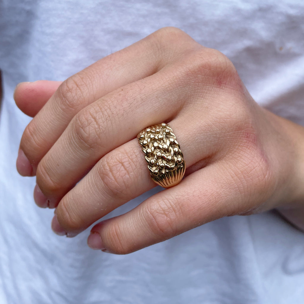 Large gold keeper ring.